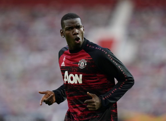 Paul Pogba of Manchester United, ManU named on the bench warms up before the UEFA Europa League match at Old Trafford, Manchester. Picture date: 5th August 2020. Picture credit should read: Andrew Yat ...
