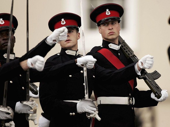 SANDHURST, ENGLAND - DECEMBER 15: HRH Prince William (R) marches while taking part in The Sovereign&#039;s Parade at The Royal Military Academy Sandhurst on December 15, 2006 in Sandhurst, England.The ...