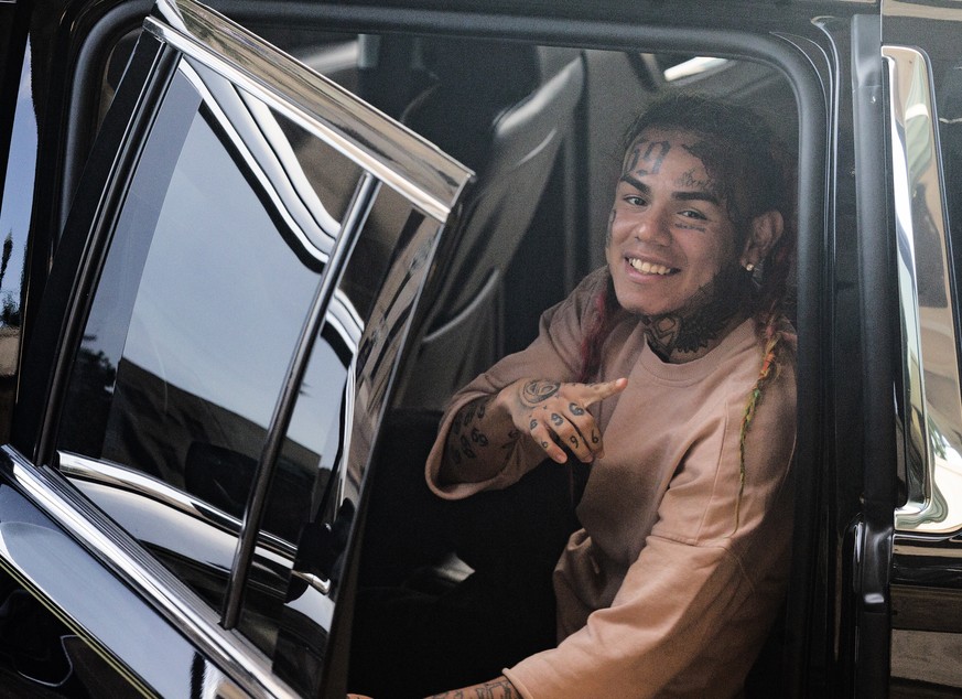 HOUSTON, TX - AUGUST 22: Rapper Tekashi69, real name Daniel Hernandez and also known as 6ix9ine, Tekashi 6ix9ine, Tekashi 69, leaves after his arraignment on assault charges in County Criminal Court # ...