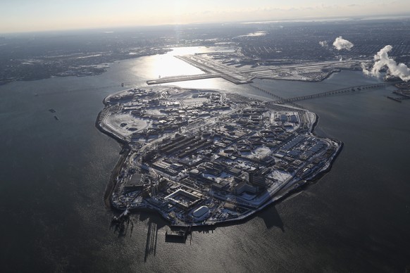 NEW YORK, NY - JANUARY 05: Rikers Island jail complex stands under a blanket of snow on January 5, 2018 in the Bronx borough of New York City. Under frigid temperatures, New York City dug out from the ...