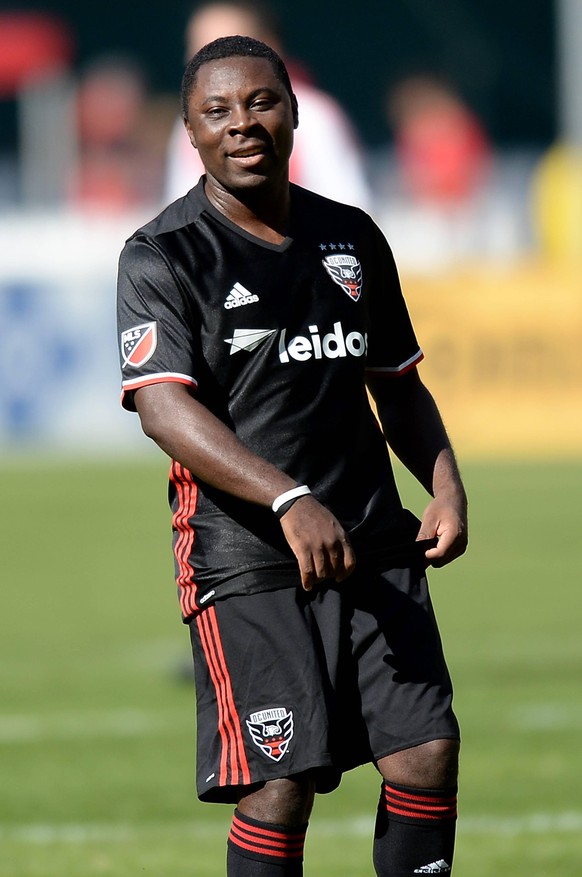 October 22, 2017 - Washington, DC, USA - 20171022 - Former D.C. United player FREDDY ADU is seen during the D.C. United Legends match at RFK Stadium in Washington. Soccer 2017 - D.C. United Legends Ma ...