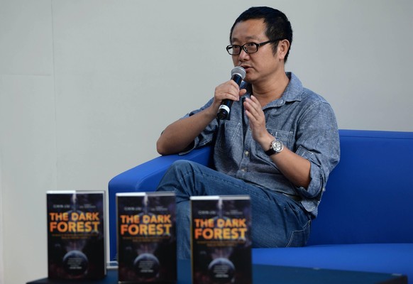 (150829) -- BEIJING, Aug. 29, 2015 -- Science fiction author Liu Cixin answers questions from readers in Beijing, capital of China, Aug. 29, 2015. Liu Cixin, winner of the 2015 Hugo Award for Best Nov ...