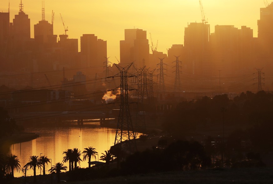 MELBOURNE HOT WEATHER, The sun rises over Melbourne as the temperature is expected to be above forty degrees and power supplies are expected to be put under pressure. Friday, December 20. 2019. ACHTUN ...