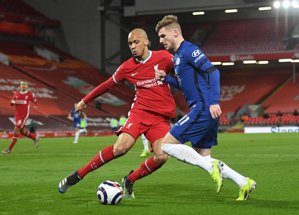 Liverpool v Chelsea - Premier League - Anfield Liverpool s Fabinho left and Chelsea s Timo Werner battle for the ball during the Premier League match at Anfield, Liverpool. Picture date: Thursday Marc ...