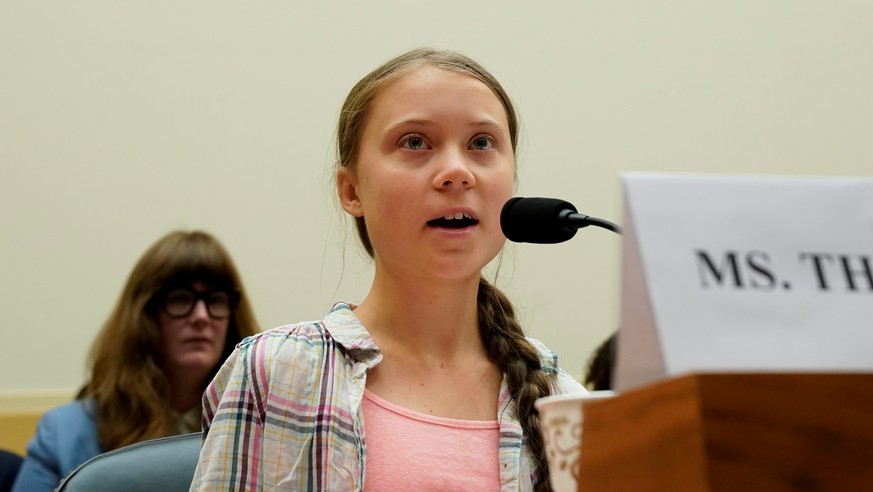 FILE PHOTO: Sixteen year-old Swedish climate activist Greta Thunberg testifies at a House Foreign Affairs subcommittee and House Select Climate Crisis Committee joint hearing on &quot;Voices Leading t ...