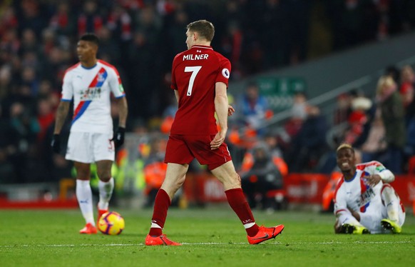 Soccer Football - Premier League - Liverpool v Crystal Palace - Anfield, Liverpool, Britain - January 19, 2019 Liverpool&#039;s James Milner walks off as he is shown a red card by referee Jonathan Mos ...