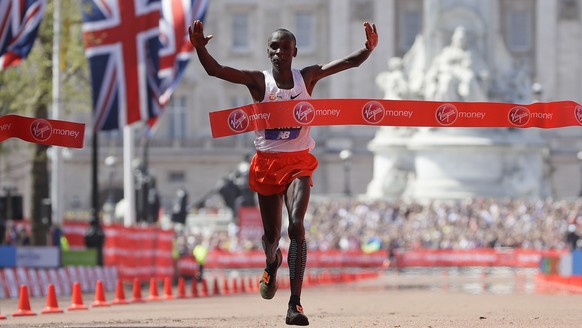 Kenya&#039;s Eliud Kipchoge reacts after crossing the finish line to win the Men&#039;s race in the London Marathon in central London, Sunday, April 22, 2018.(AP Photo/Kirsty Wigglesworth)