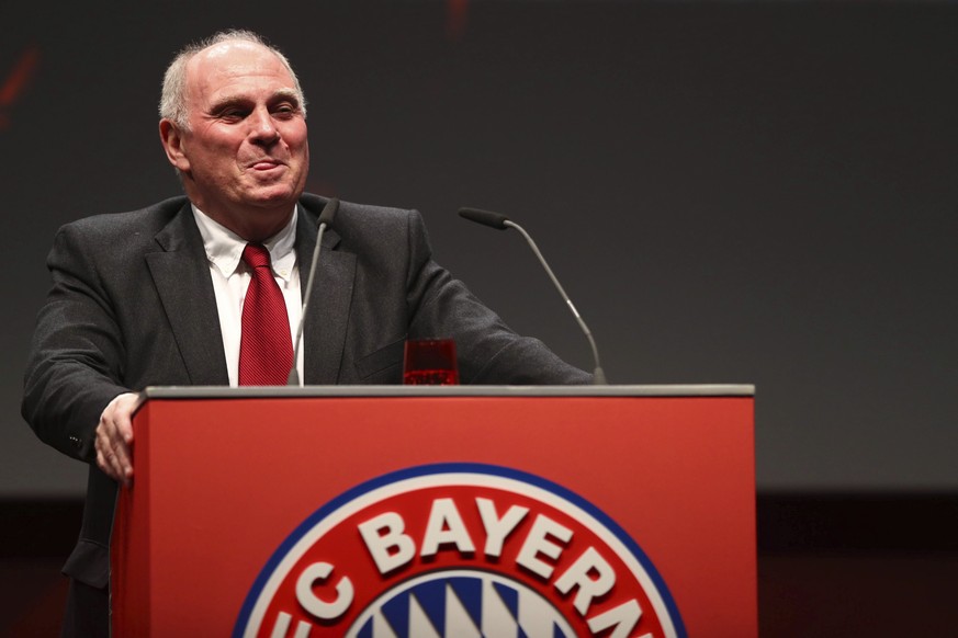 Bayern Munich president Uli Hoeness smiles on the podium during his speech and his farewell at the annual general meeting of FC Bayern Munich soccer club in Munich, Germany, Friday, Nov. 15, 2019. (AP ...