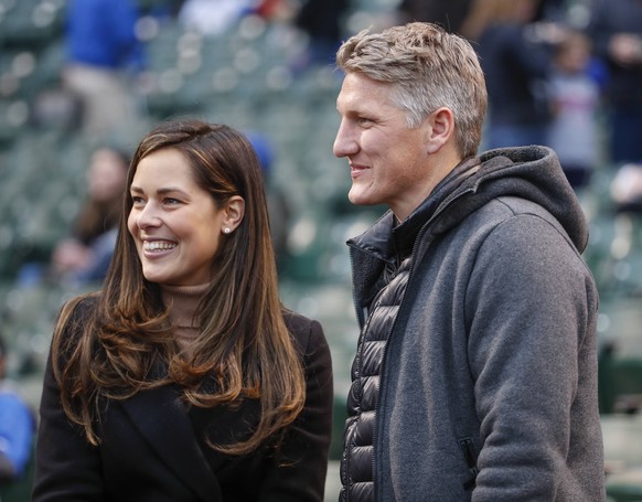 Chicago Fire soccer player Bastian Schweinsteiger (R) and his wife Ana Ivanovic attend the Chicago Cubs game against the Philadelphia Phillies at Wrigley Field on May 2, 2017 in Chicago. PUBLICATIONxI ...