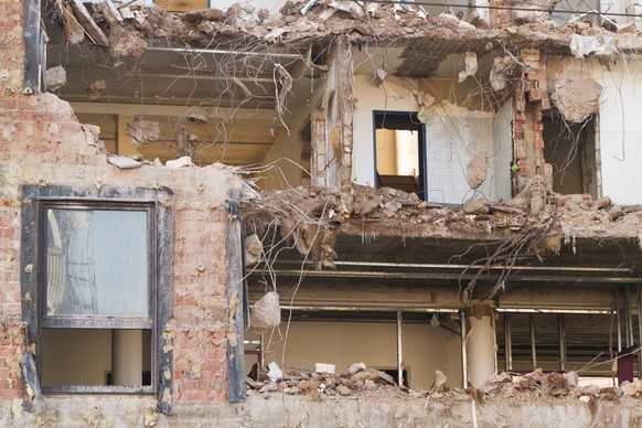 Heavily demolished building. Missing outer walls. One window still left intact.More of this series: